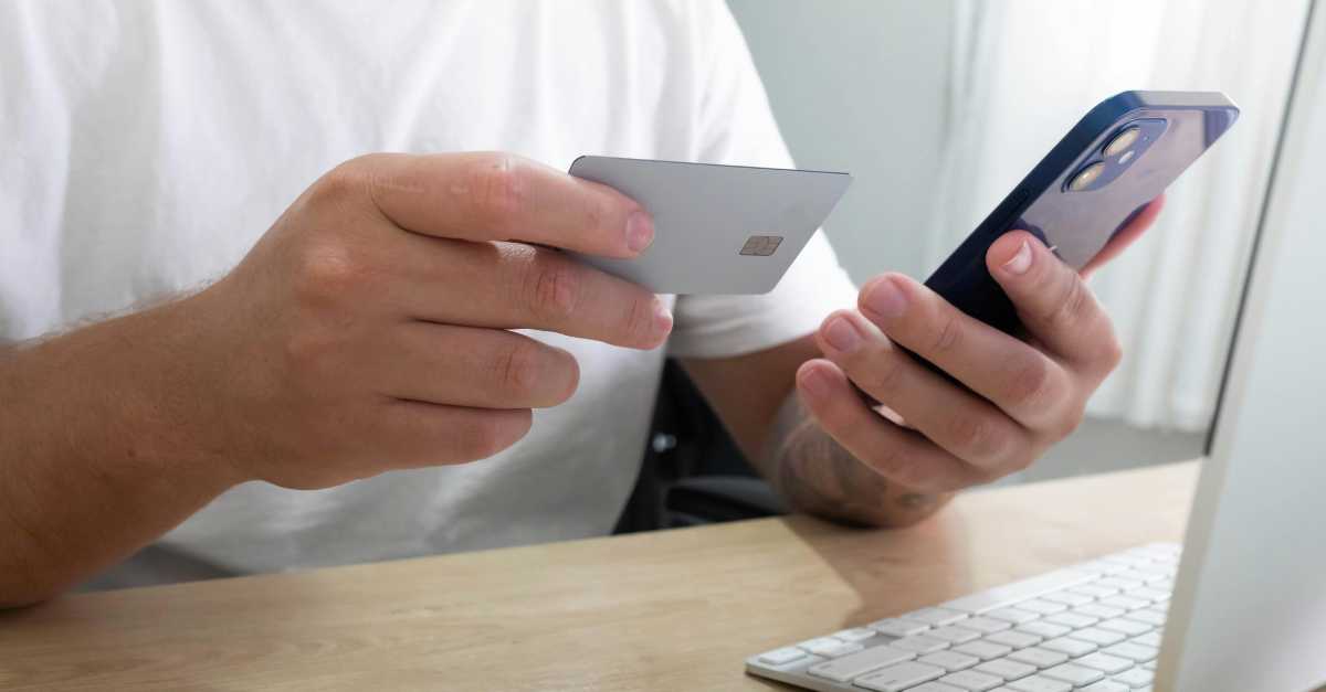 Patient making a payment on their phone