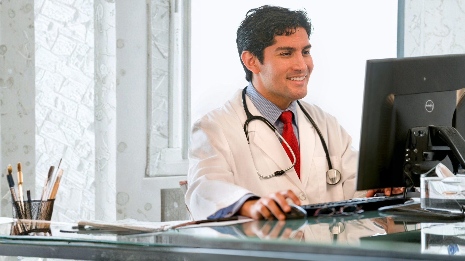 A doctor smiling knowing that there are no medical billing errors