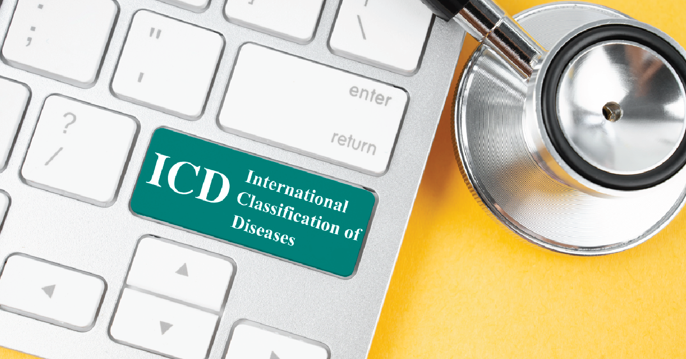 Navigating ICD-10 code changes - ICD words on a laptop keyboard with a doctor’s stethoscope.