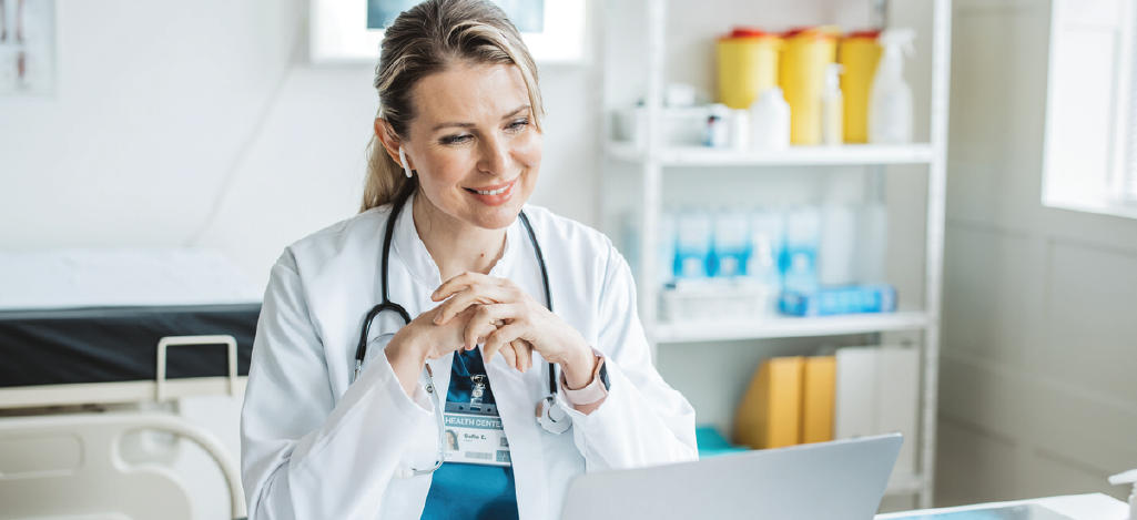 Female doctor speaking with her patient during a telehealth consultation.