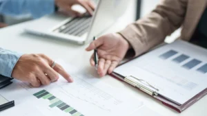 Three office managers showcasing manual billing with paper and clipboards