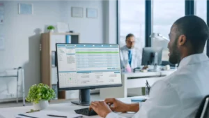 Office manager looking at healthcare payment technology