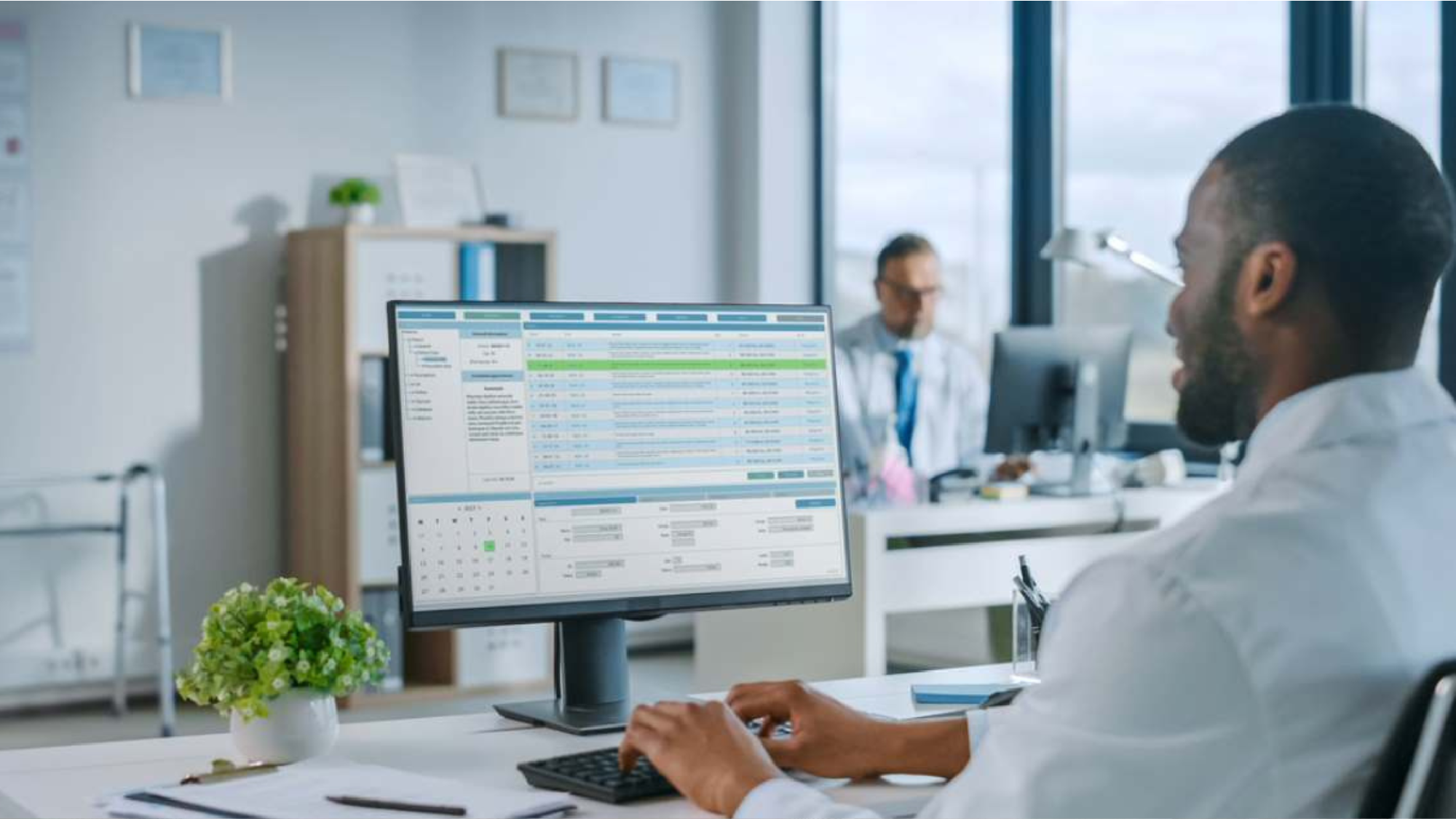 Office manager looking at healthcare payment technology