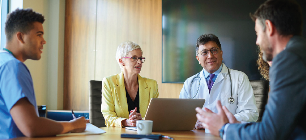 Medical billing managers having a meeting with their practice’s medical billing software provider.