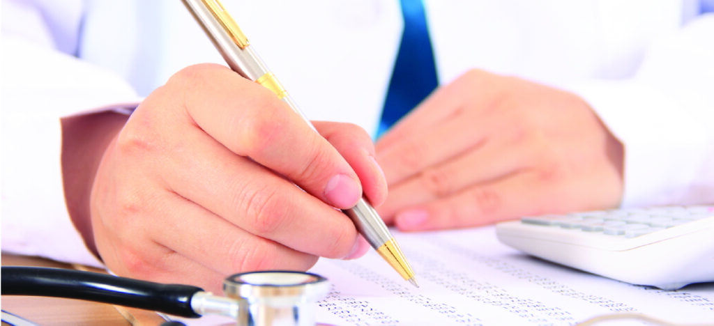 Preventing delayed payments - A doctor reviewing a hospital’s financial statements.